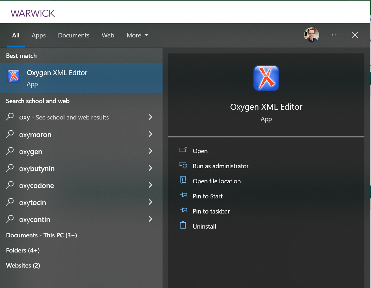 Windows start menu showing Oxygen XML Editor